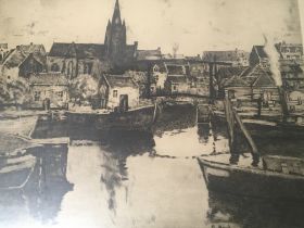 A framed 19th century etching study of harbour pos