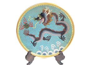 A Chinese cloisonnÃ© enamel plate. Diameter 21cm.