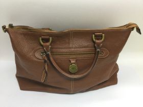 A brown leather tote bag. Shipping category B.