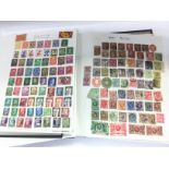 A collection of world stamp albums including QE2 joined Â£1 stamps and many more. Shipping