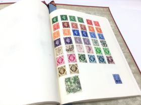 A British & Commonwealth stamp album, postage cate