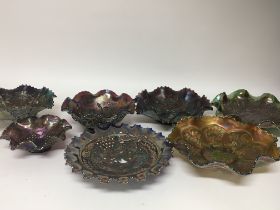 A collection of Carnival glass dishes no obvious d