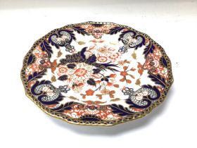 One 1960s royal crown derby Imari patterned plate.