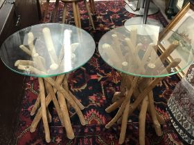 A pair of modern design glass and beach wood table