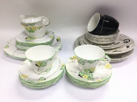 A Homemaker part dinner and tea service and an English bone china part tea service with floral