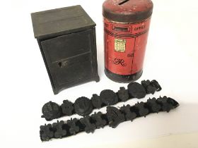 A Late Victorian cast iron money box in the form of a safe and a George VI post office money box and