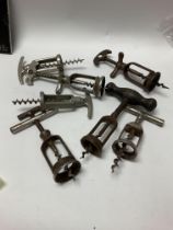 Eight vintage steel corkscrews.