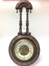 A small Victorian cased barometer with thermometer