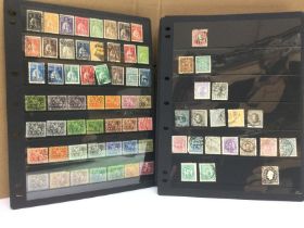Eight albums of world postage stamps including Sweden, Spain, Switzerland, USA and New Zealand.