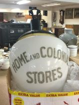 A vintage home and colonial stores glass window la