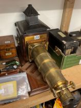 A large brass and mahogany lantern slide projector