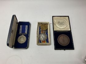 Four medals including two WWI medals, one police m