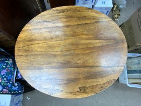 A Victorian rosewood veneered oval tilt topped breakfast table together with 6 balloon backed dining