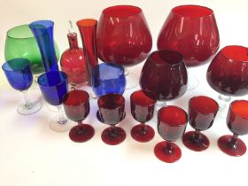 A collection of assorted coloured glass. Postage D