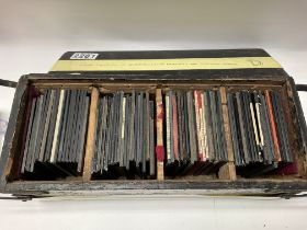 A cased collection of lantern slides including adv