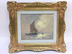 A gilt framed oil on canvas of fishing boats by Vi
