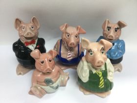 Five Wade Natwest pigs. Shipping category D.