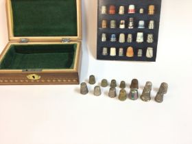 A box containing a small collection of assorted th