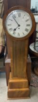 An Art Deco granddaughter clock with circular dial . H.129cm