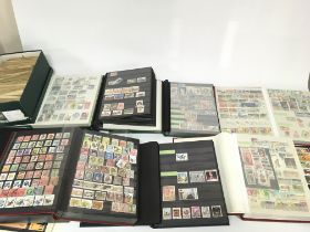 A large collection of assorted stamps including 9