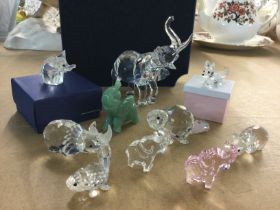 A boxed Swarovski elephant having tusks, together