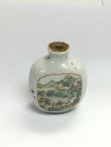 A famille rose scent bottle with hand painted land