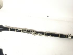 A Vintage ebony Clarinet maker Hans Kreul retailed by Meyer Bro New York stamped Medium Chambered.