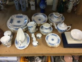 A Coalport tea and dinner set including cutlery, a