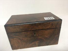 A Victorian walnut tea caddy of rectangular shape with a hinged top 22cmx13cm