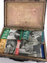 A case containing Vintage Elvis Monthly Magazines
