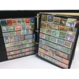 Two crates containing eleven albums of various world postage stamps including USA, Portugal,