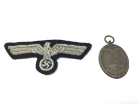 WW2 Third Reich items including a breast eagle and