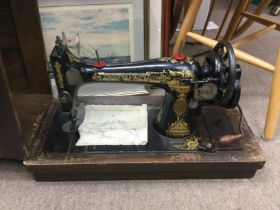 A Singer sewing machine. Shipping category D.- NO