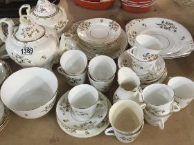 A Victorian tea set white glazed and decorated wit