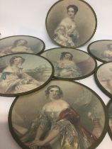 A collection of eight circular prints depicting Vi