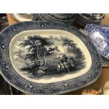 A collection of blue and white ceramics including a Victorian meat plate the centre depicting a