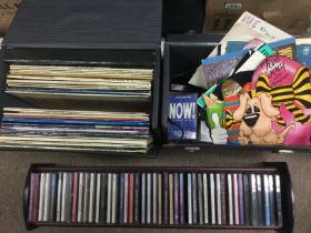 Two record cases containing LPs, 7inch singles and
