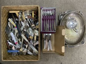 A basket of mixed flatware and silver plate. (D)