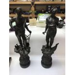 A pair of spelter figures approx 66cm.
