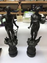 A pair of spelter figures approx 66cm.