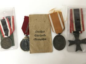 A collection of four German Third Reich medals Naz