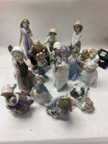 A collection of ceramic figures including nao figu