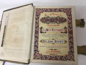 A large Victorian family bible with gilt metal cla