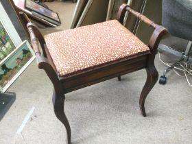 A mahogany framed piano stool. Shipping category D.