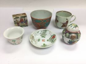 Six small Oriental ceramic items comprising tea bo