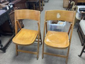 A pair of vintage Stoel & Meubelfabriek folding ch