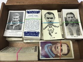 A Collection of vintage footballer cigarette cards