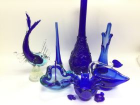 A collection of blue glass items including Murano examples, Shipping category D.