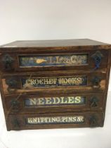 A late Victorian shop cabinet with four drawers wi