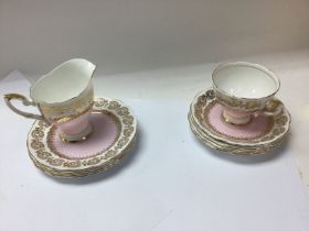 A boxed fine bone tea set.